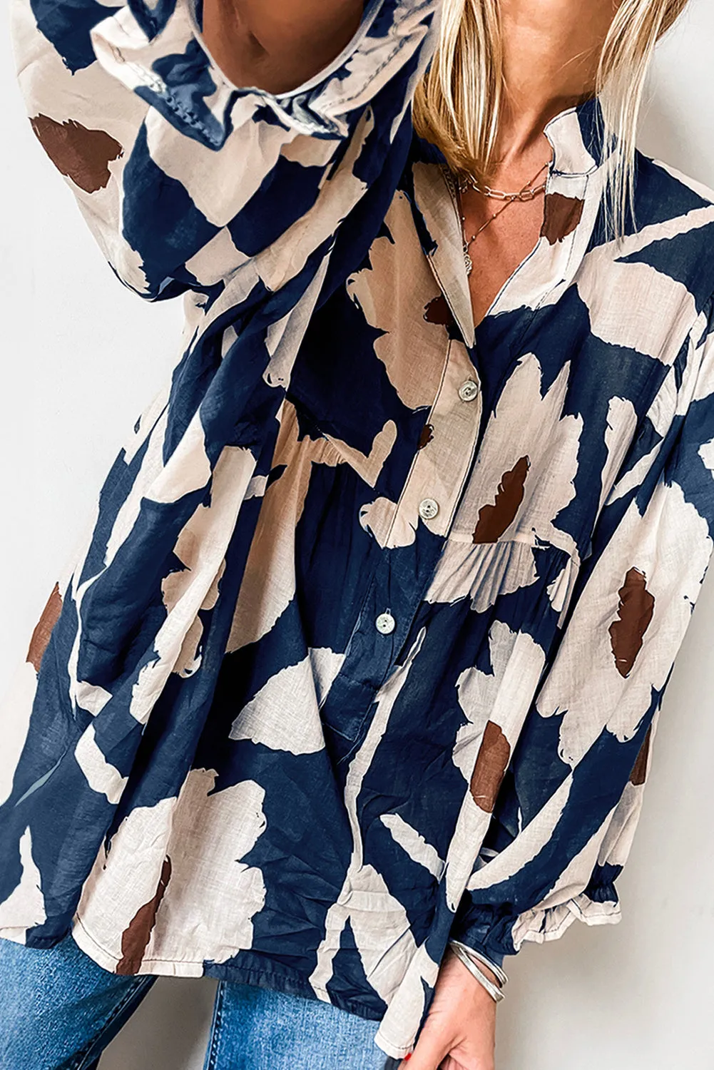 Sail Blue Abstract Floral Print Puff Sleeve Half Button Blouse sold by Beagle Boutique