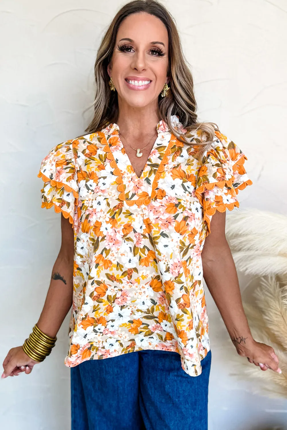 Russet Orange Ruffled V Neck Scalloped Short Sleeve Floral Blouse sold by Beagle Boutique product image thumbnail 3