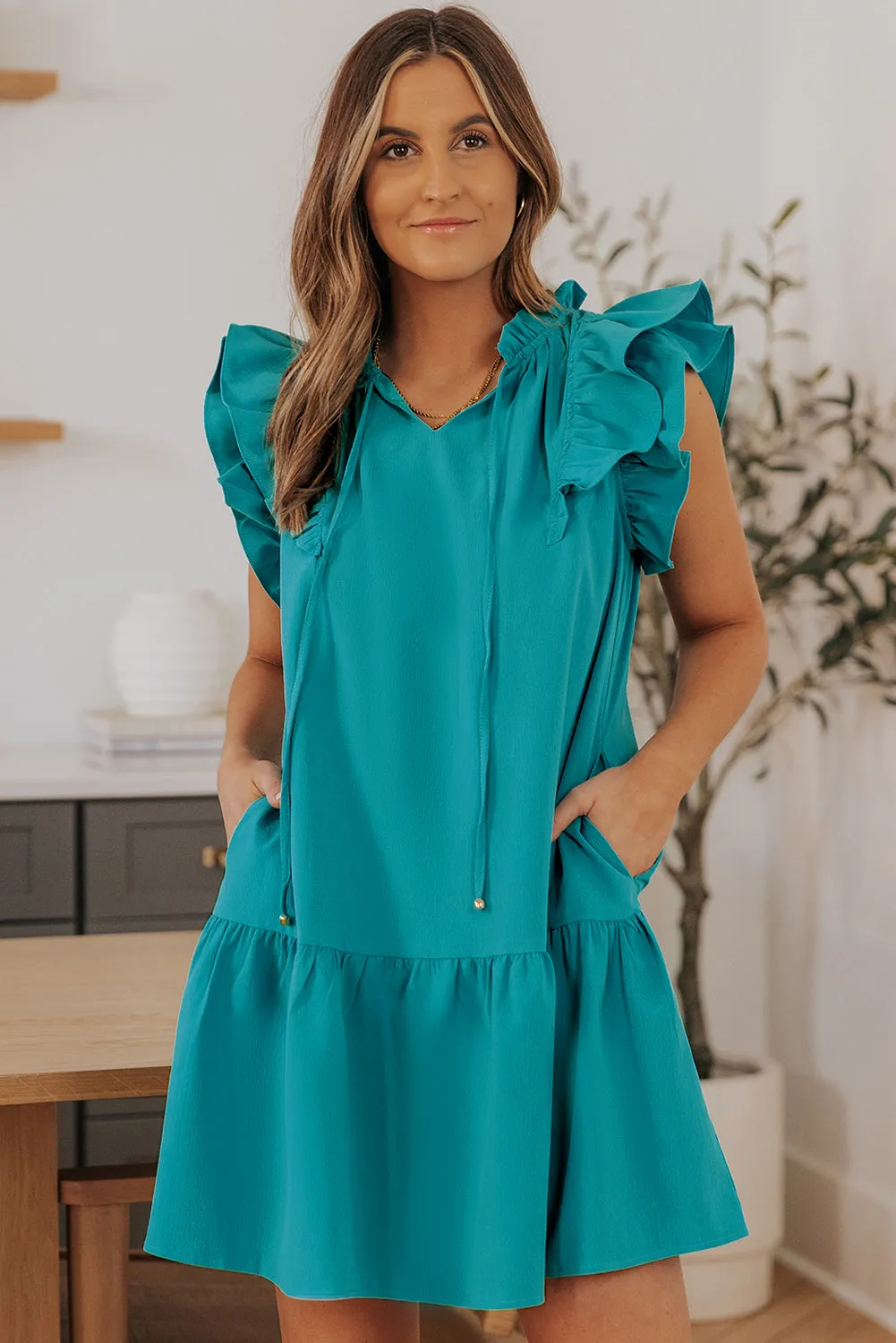 Green Tiered Ruffled Sleeves Mini Dress with Pockets sold by Beagle Boutique