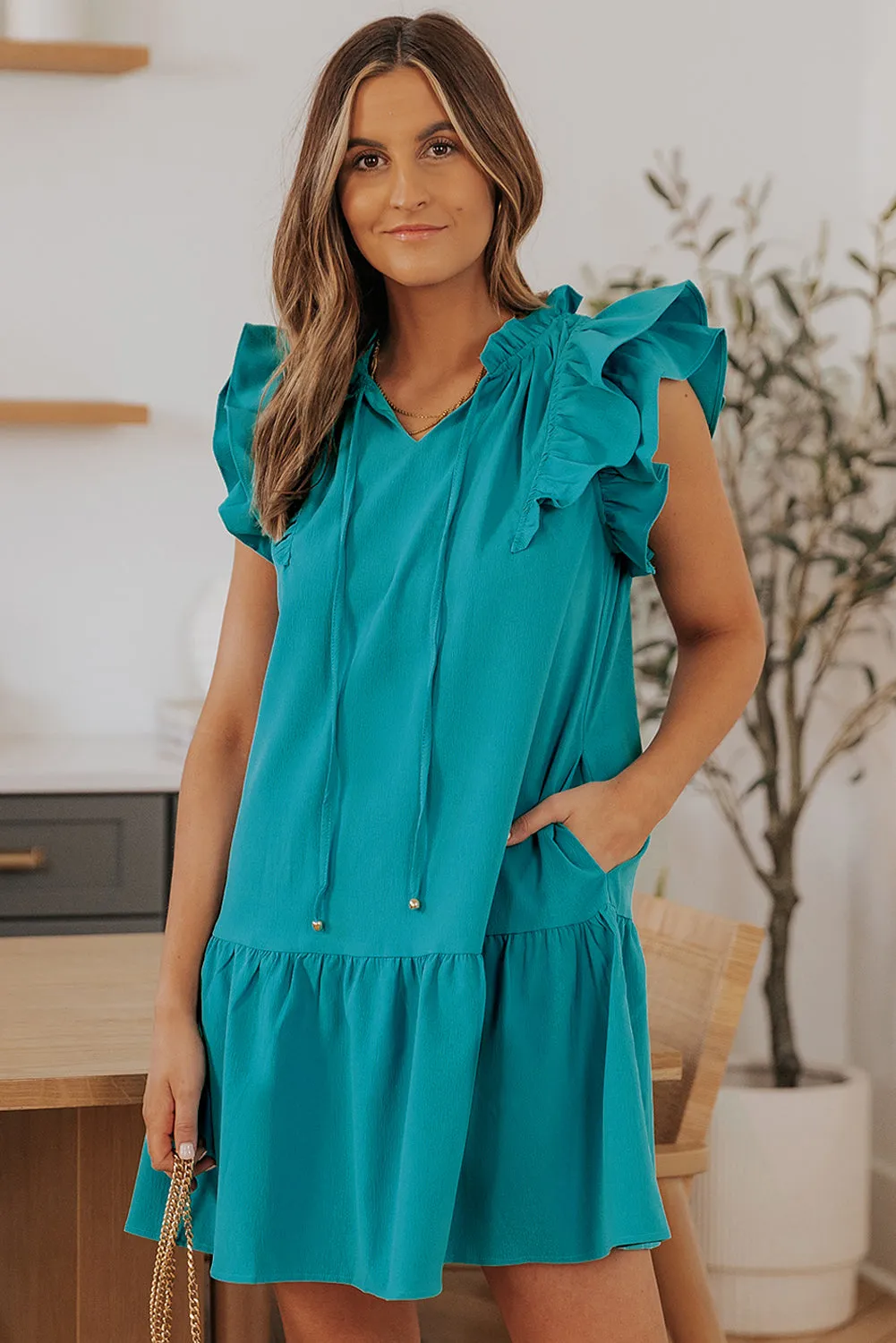 Green Tiered Ruffled Sleeves Mini Dress with Pockets sold by Beagle Boutique product image thumbnail 3