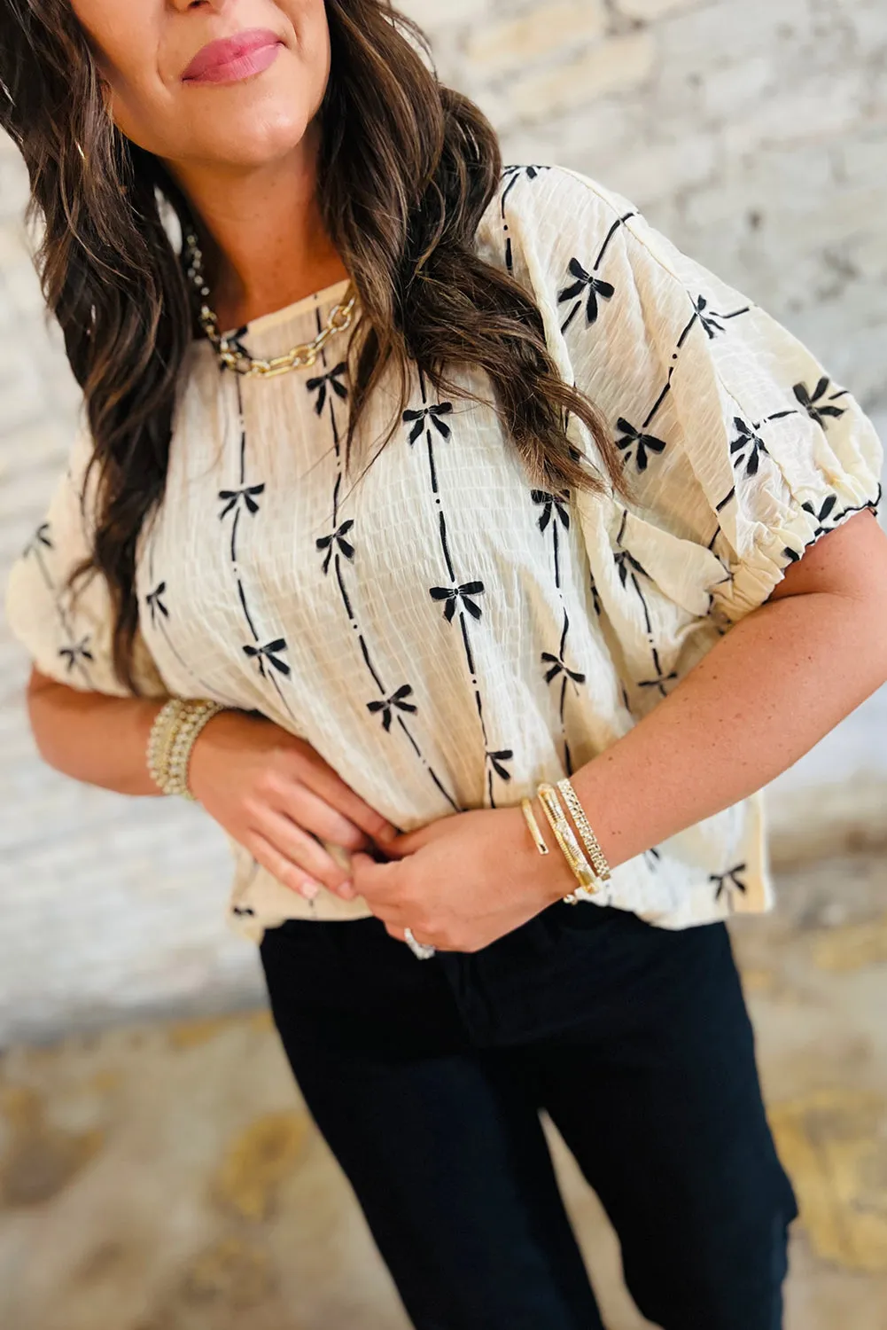 Beige Bow Print Puff Short Sleeve Top sold by Beagle Boutique