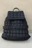 Black Solid Flapped Quilted Puffer Backpack sold by Beagle Boutique