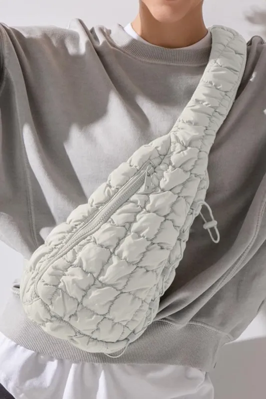 White Marshmallow Quilted Drawstring Decor Sling Bag sold by Beagle Boutique
