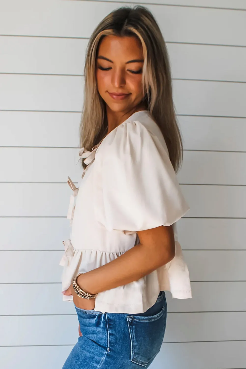 White Bow Tie Short Puff Sleeve Ruffle Hem Blouse sold by Beagle Boutique product image thumbnail 2