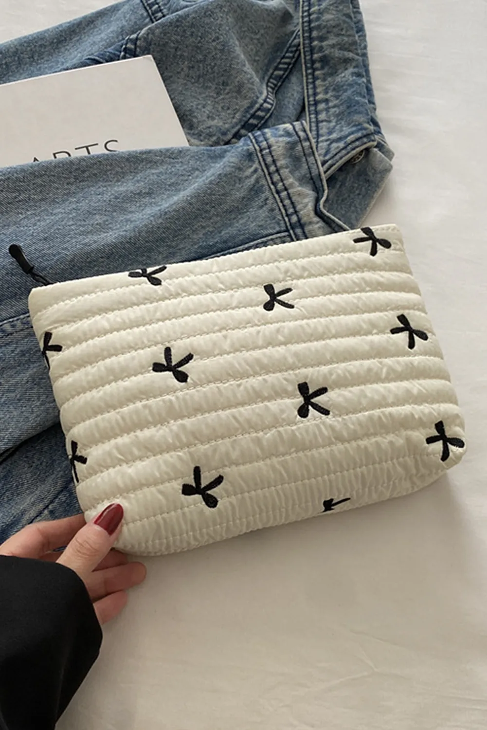 White Bow Quilted Makeup Bag sold by Beagle Boutique