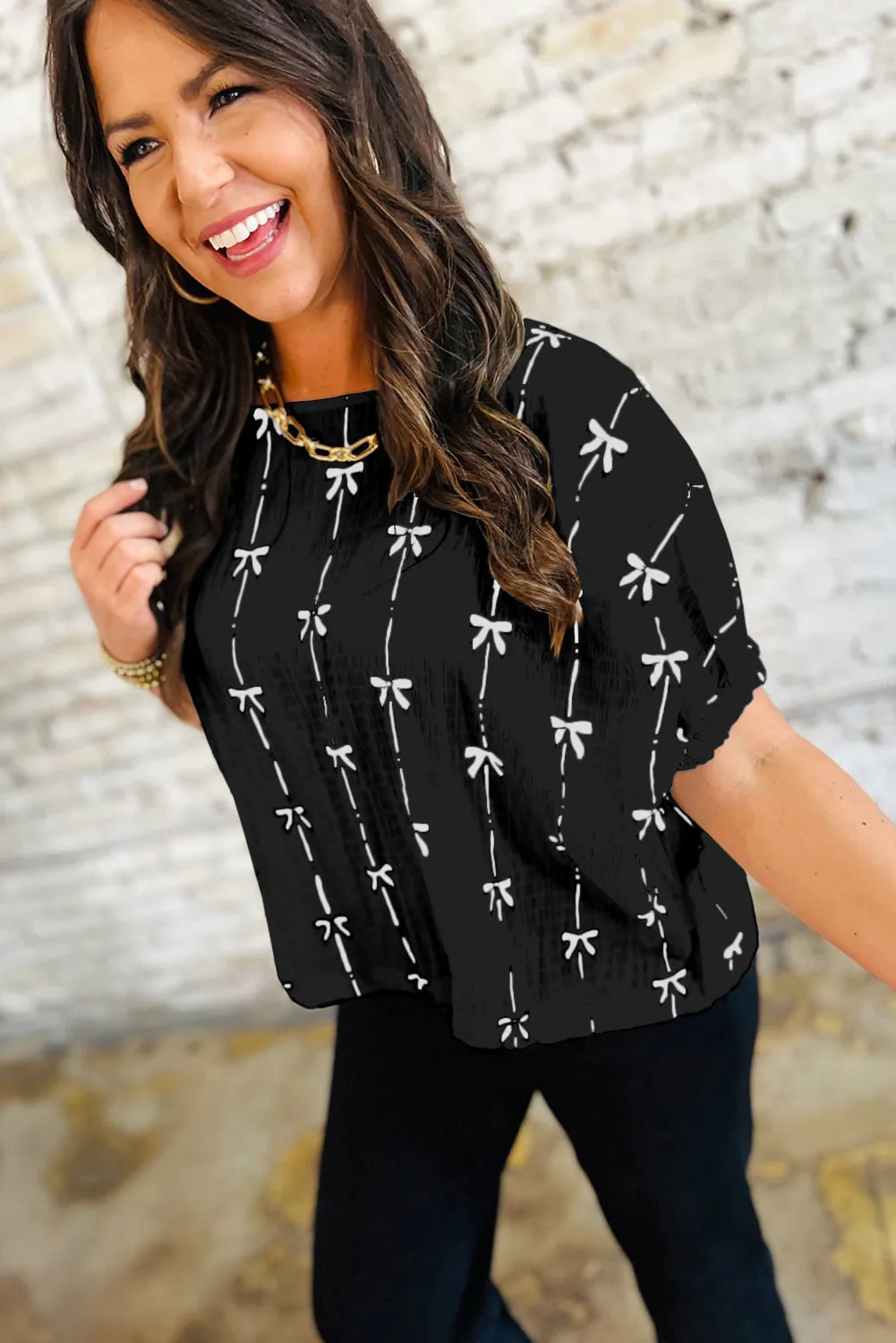 Black Bow Print Puff Short Sleeve Top sold by Beagle Boutique product image thumbnail 4