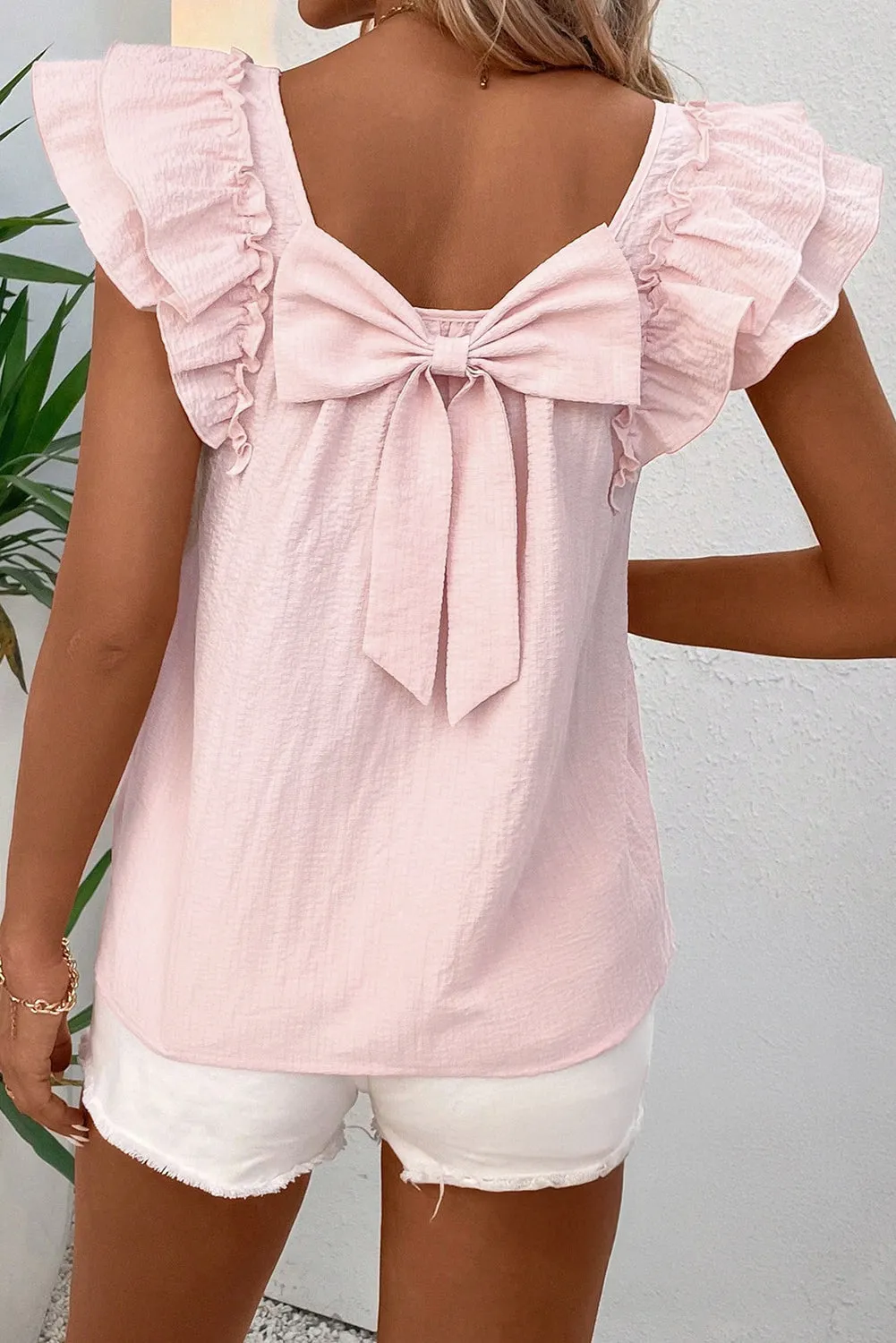 Gossamer Pink Textured Bow Knot Frilled Butterfly Sleeve Blouse sold by Beagle Boutique