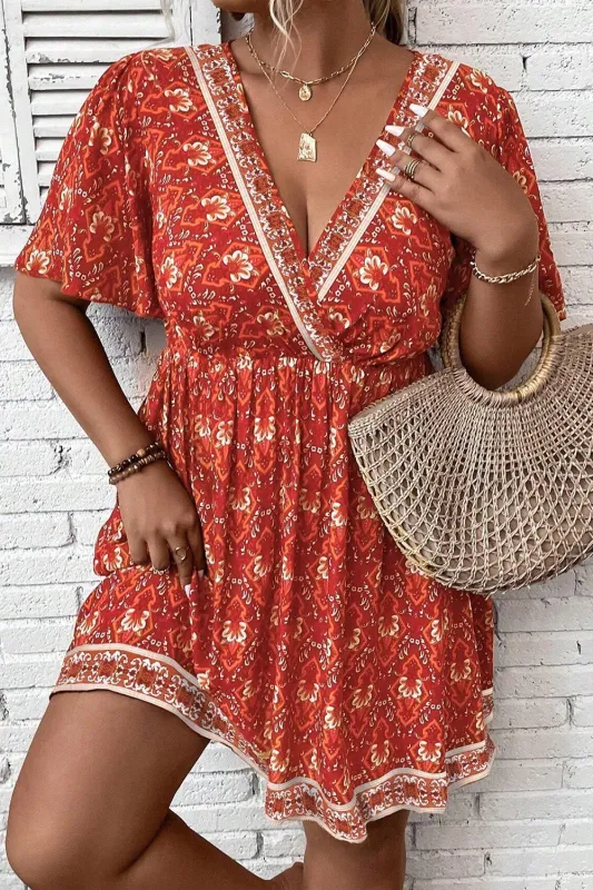 Orange Plus Size Printed Surplice Neck Empire Waist Flowy Mini Dress sold by Beagle Boutique