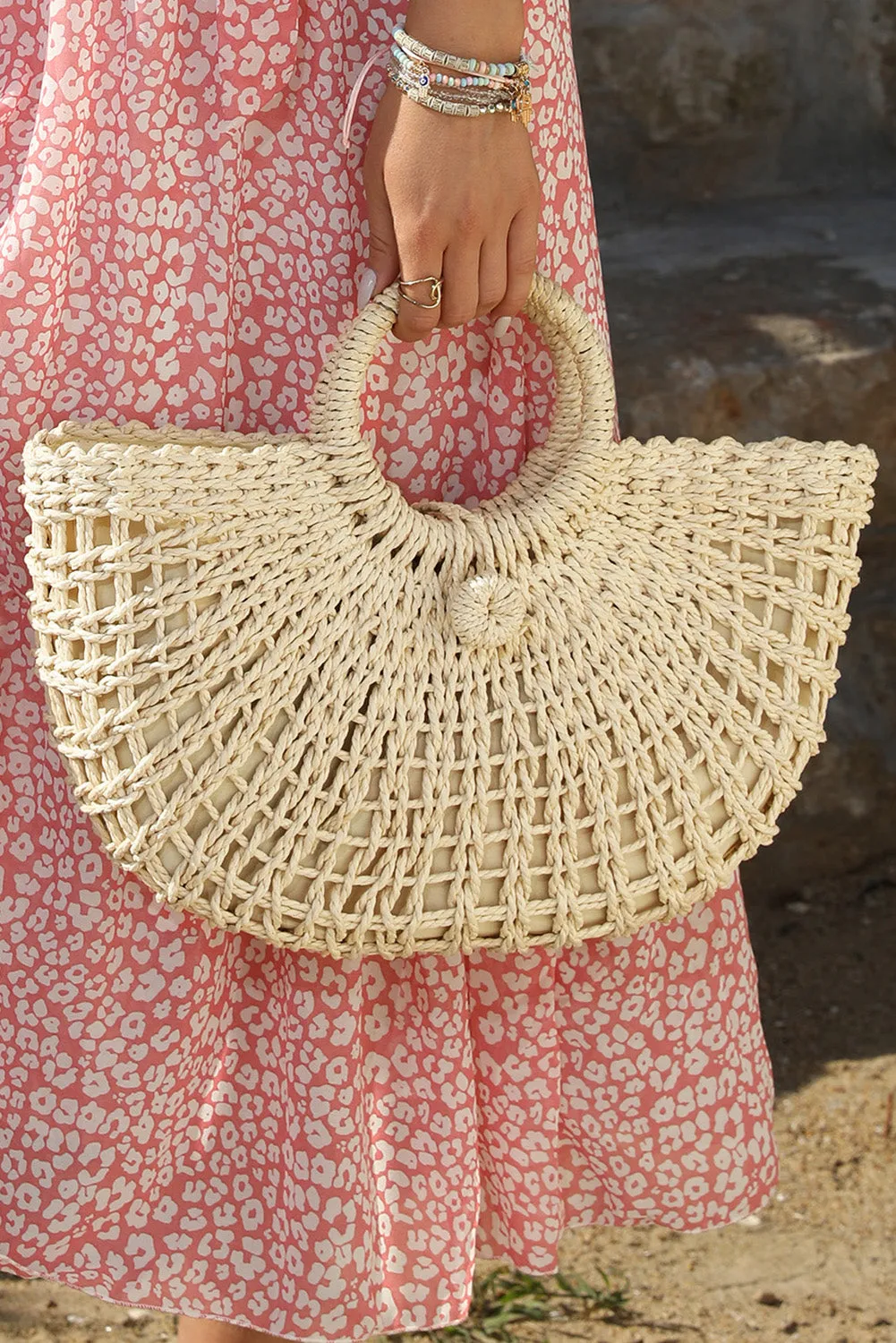 Beige Woven Round Tote Handbag sold by Beagle Boutique