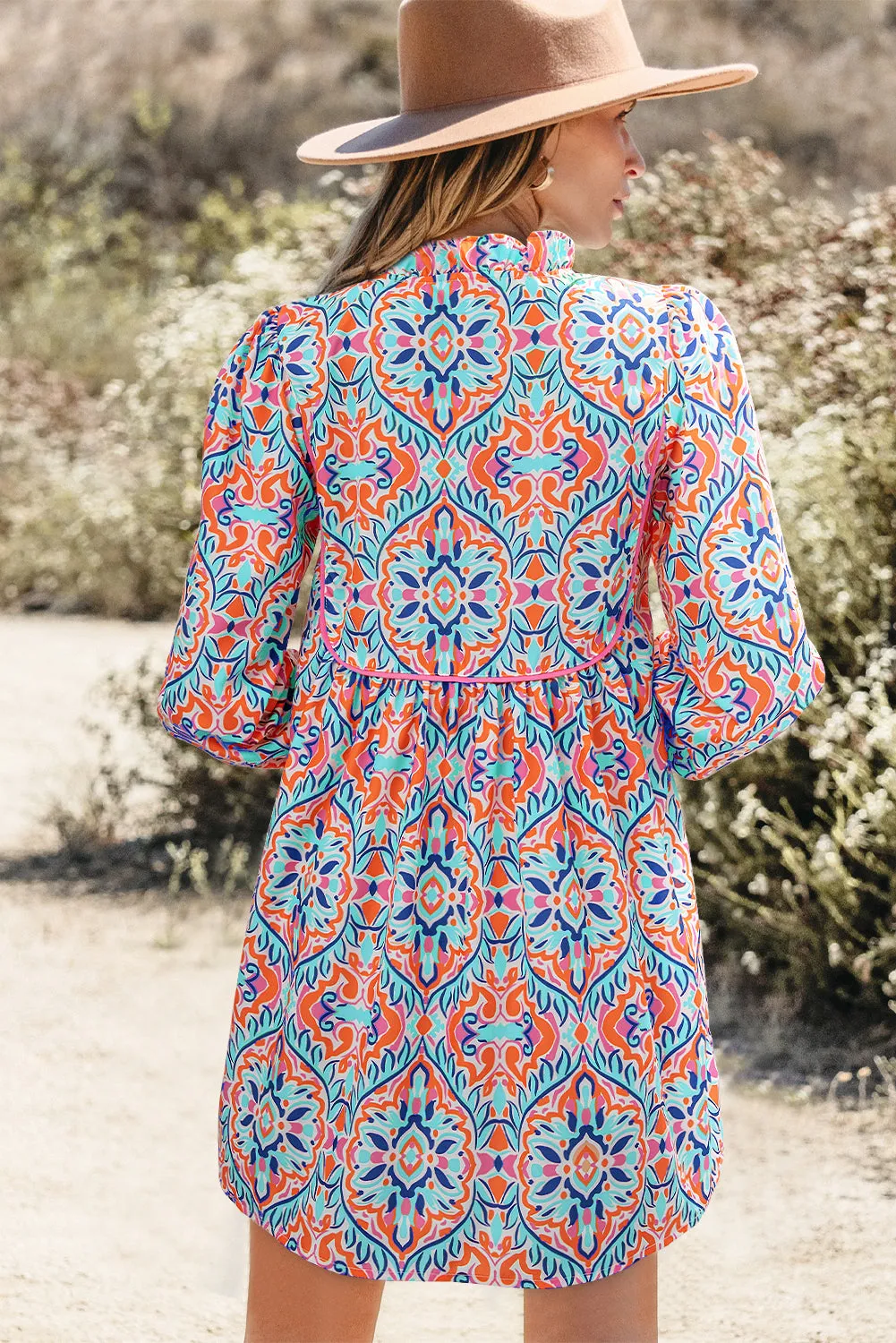Sky Blue Abstract Printed Long Sleeve Tied Neckline Mini Dress sold by Beagle Boutique product image thumbnail 2
