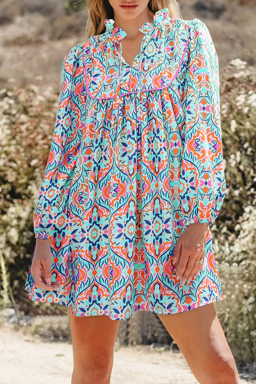 Sky Blue Abstract Printed Long Sleeve Tied Neckline Mini Dress sold by Beagle Boutique