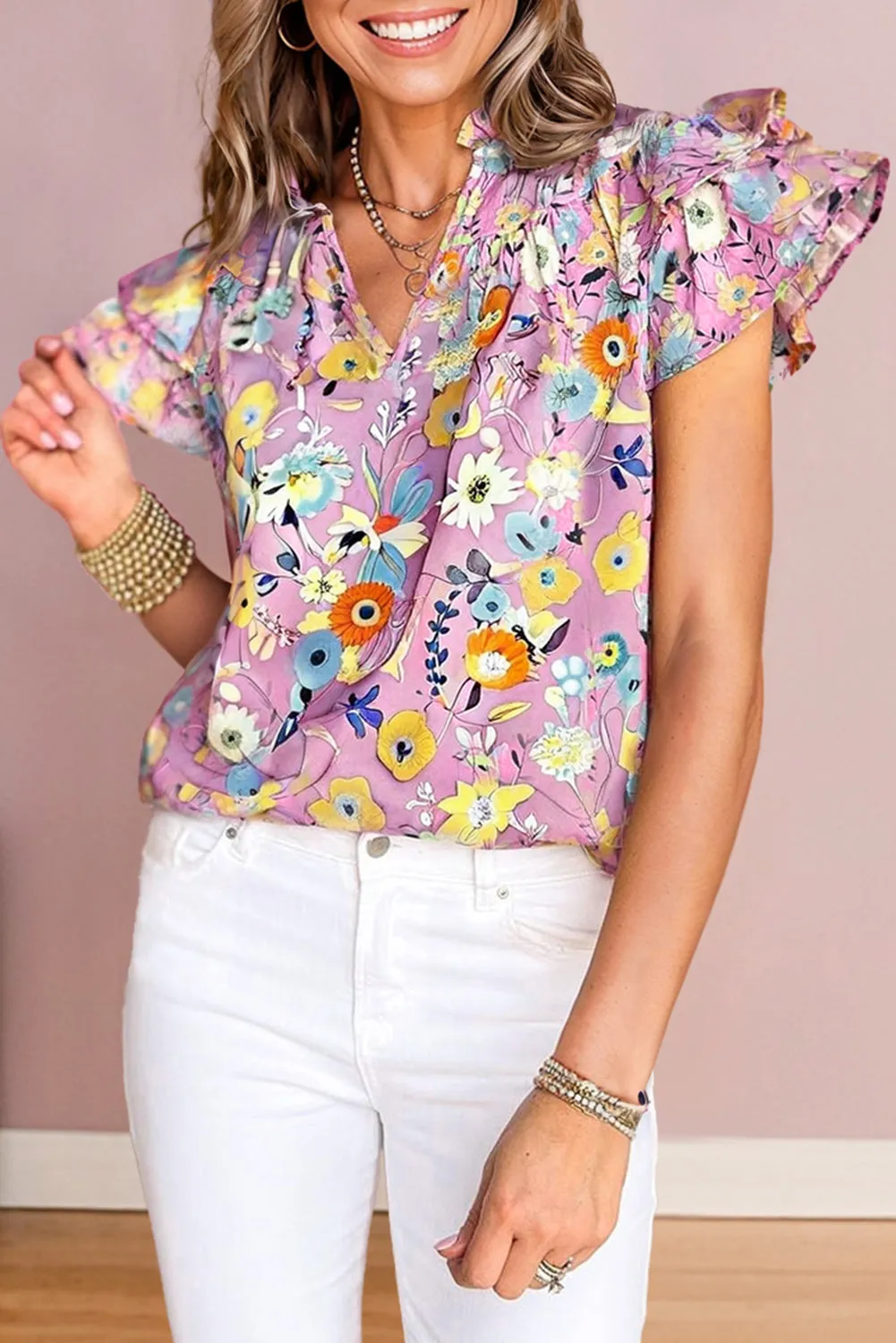 Pink Flutter Sleeve V Neck Floral Top sold by Beagle Boutique