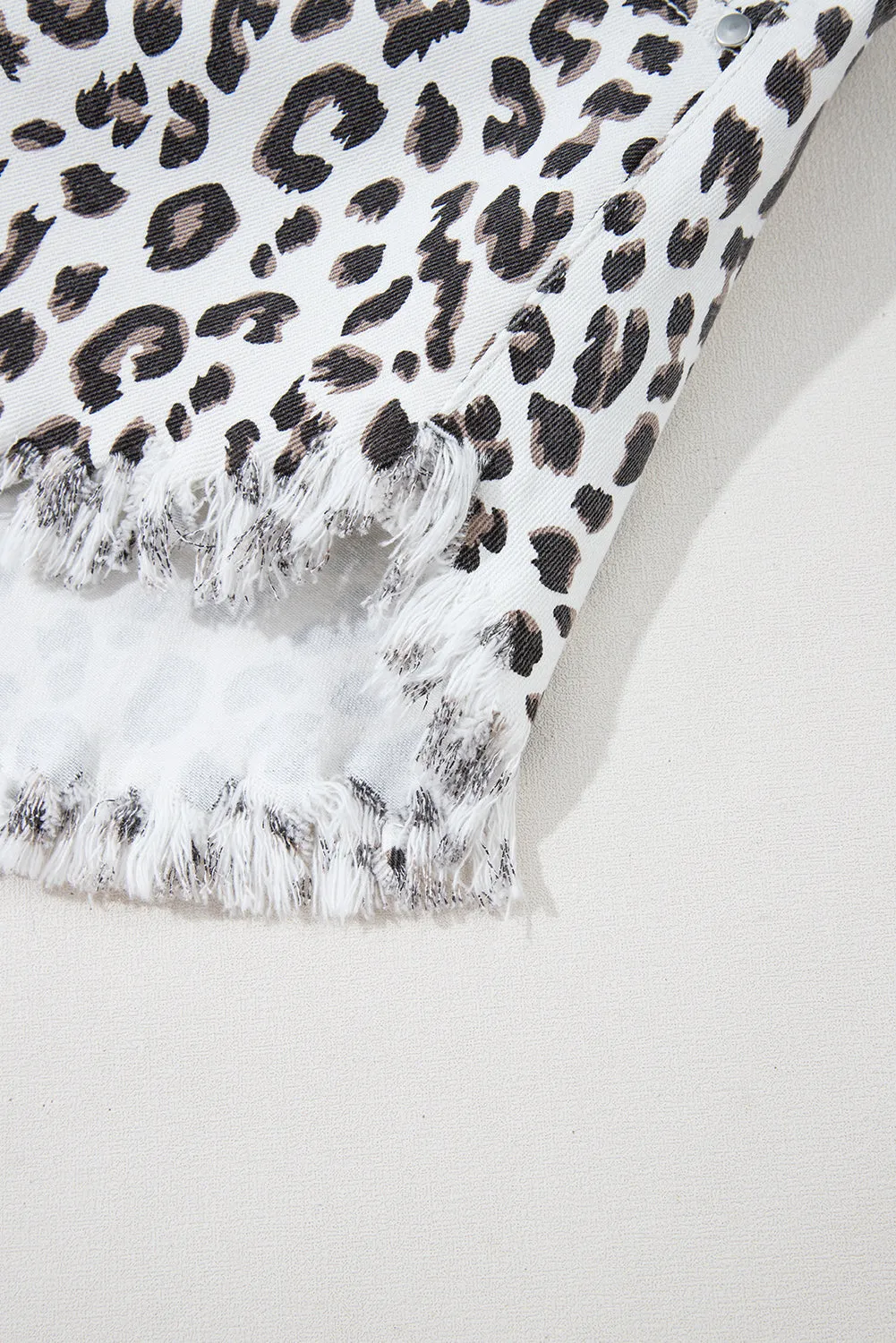 White Leopard Frayed Hem Denim Shorts sold by Beagle Boutique product image thumbnail 5