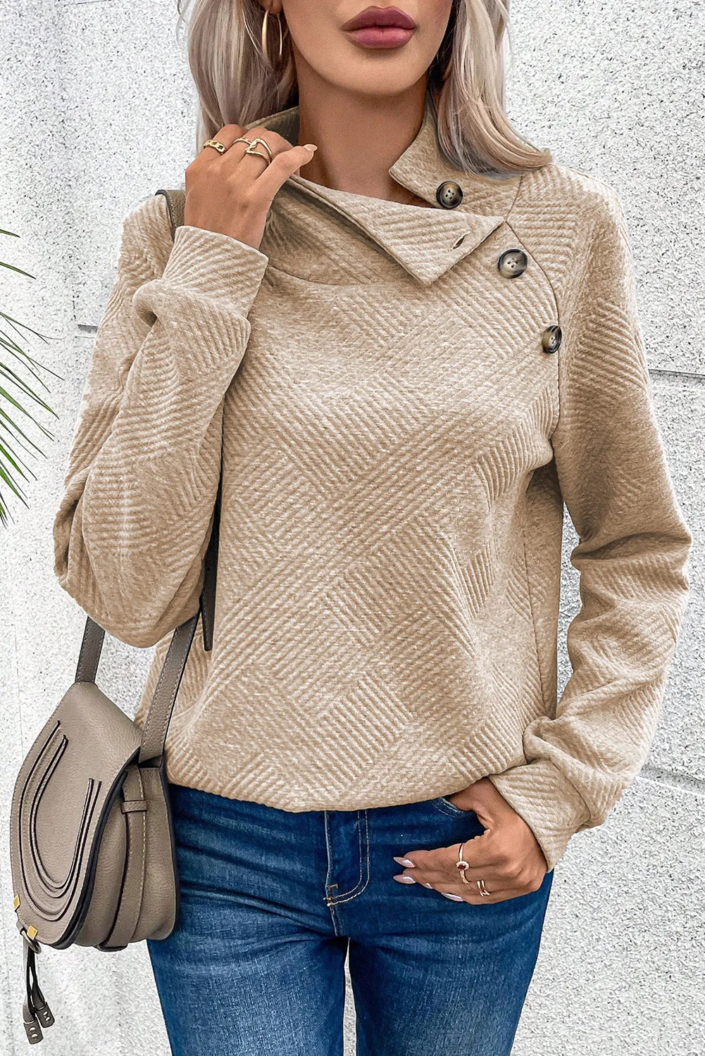 Asymmetric Buttons Detail High Neck Textured Sweatshirt sold by Beagle Boutique