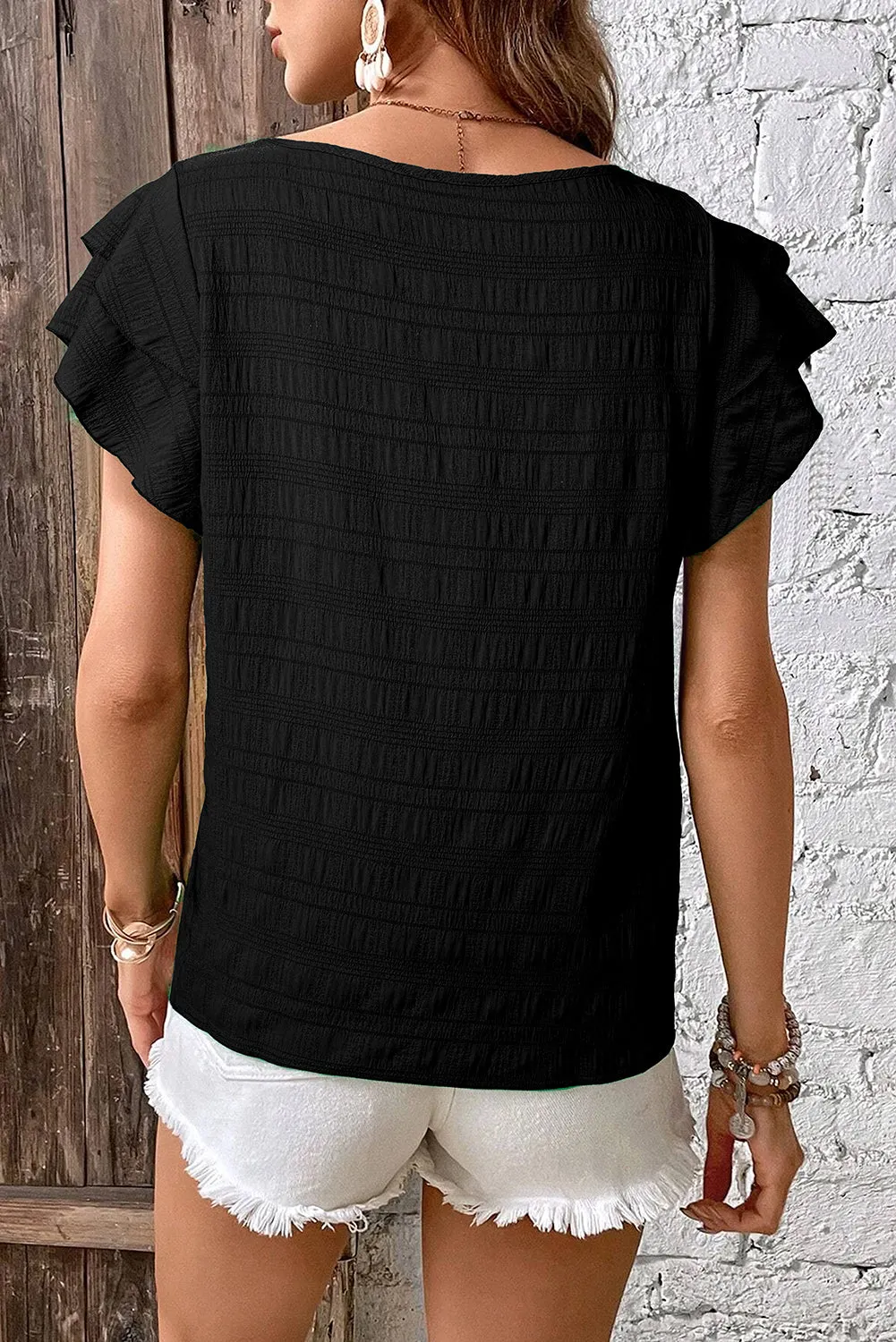 Black Textured Ruffled Sleeve Round Neck Top sold by Beagle Boutique product image thumbnail 2