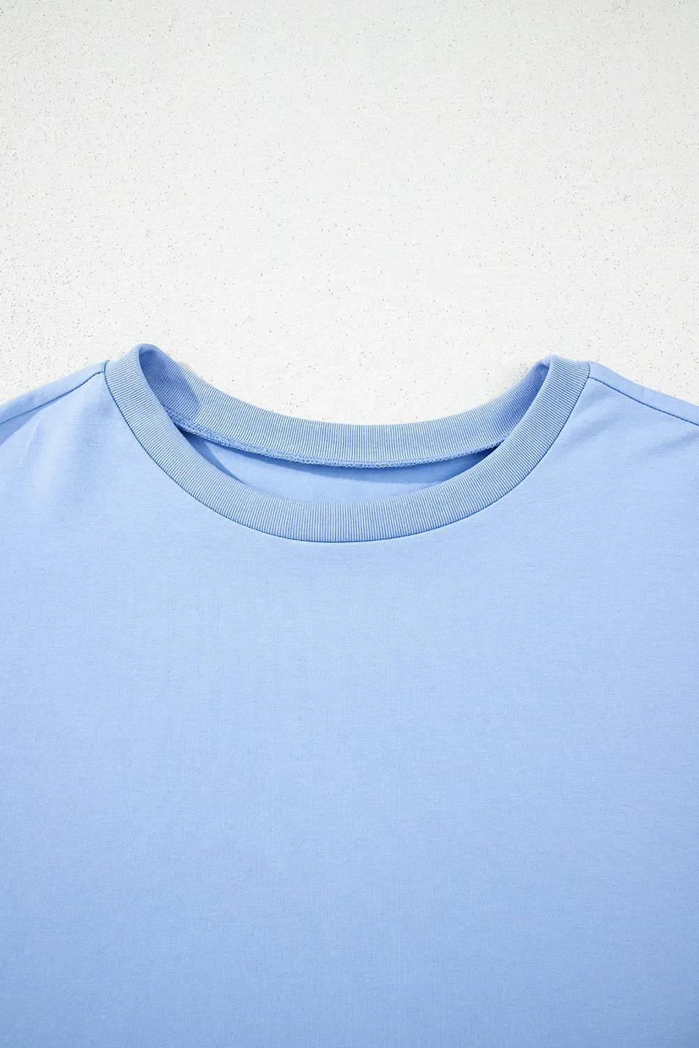 Blue Loose Half Sleeve Hi Low Hem T Shirt sold by Beagle Boutique product image thumbnail 5