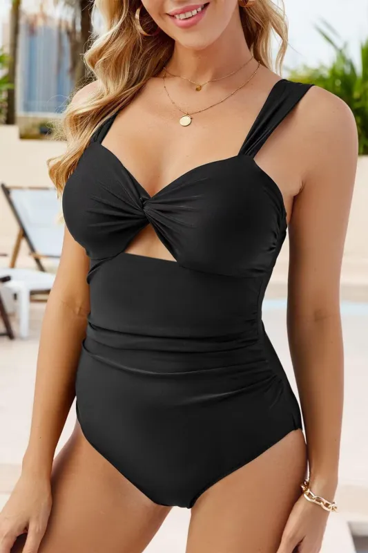 Black Cut out Twist Bowknot Backless One Piece Swimsuit sold by Beagle Boutique