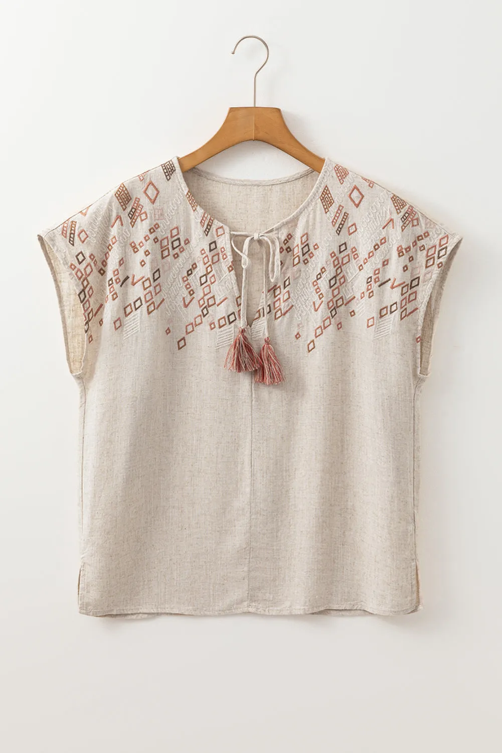 Jet Stream Geometric Embroidered Short Sleeve Tassel Tied V Neck Blouse sold by Beagle Boutique product image thumbnail 5