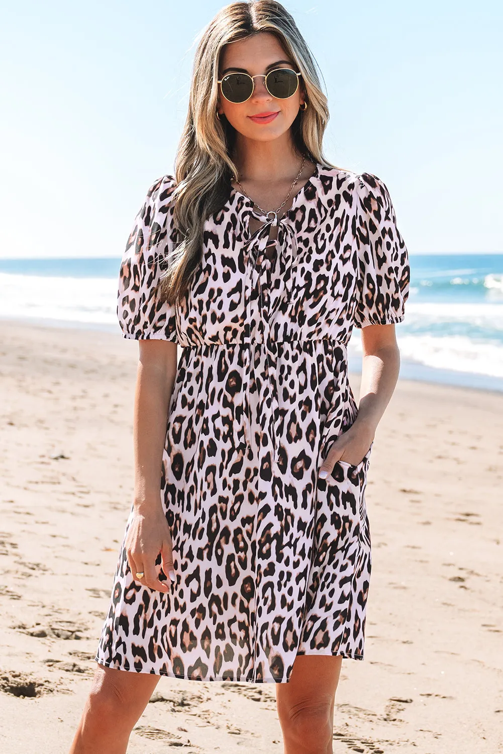 Leopard Print Tied Front Keyhole Puff Short Sleeve Mini Dress sold by Beagle Boutique