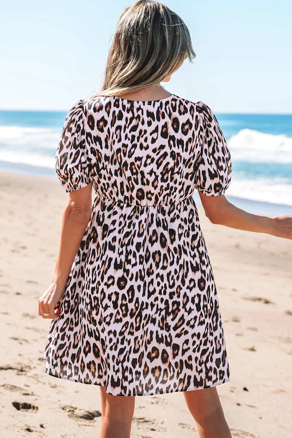 Leopard Print Tied Front Keyhole Puff Short Sleeve Mini Dress sold by Beagle Boutique product image thumbnail 2