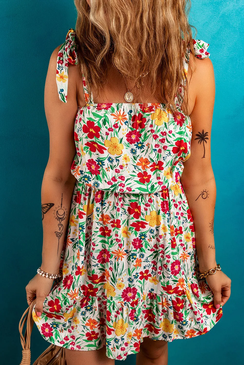 Floral Knotted Straps Cinched Waist Ruffle Hem Mini Dress sold by Beagle Boutique