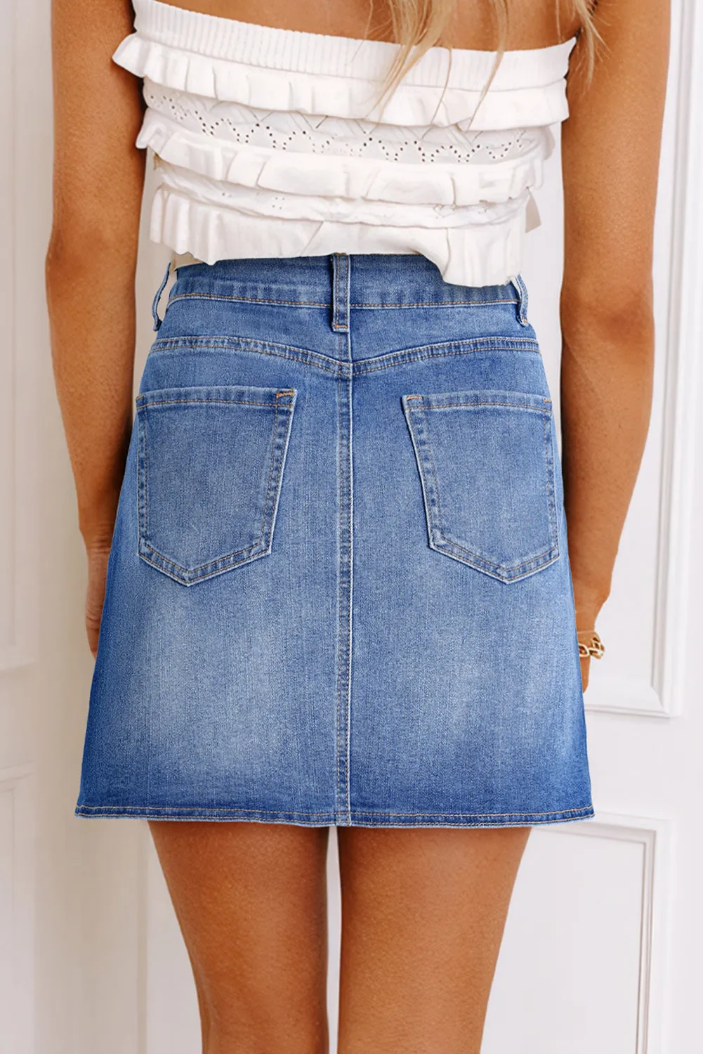Ashleigh Blue Wrapped Crossed Waist Denim Mini Skirt sold by Beagle Boutique product image thumbnail 2