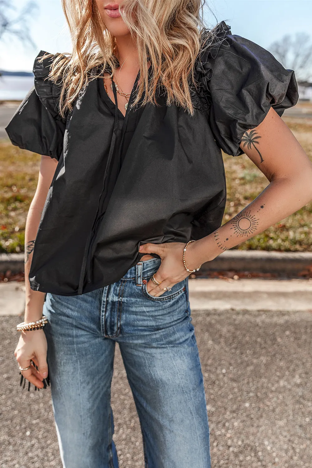 Black Ruffled Puff Short Sleeve Loose Blouse sold by Beagle Boutique product image thumbnail 4