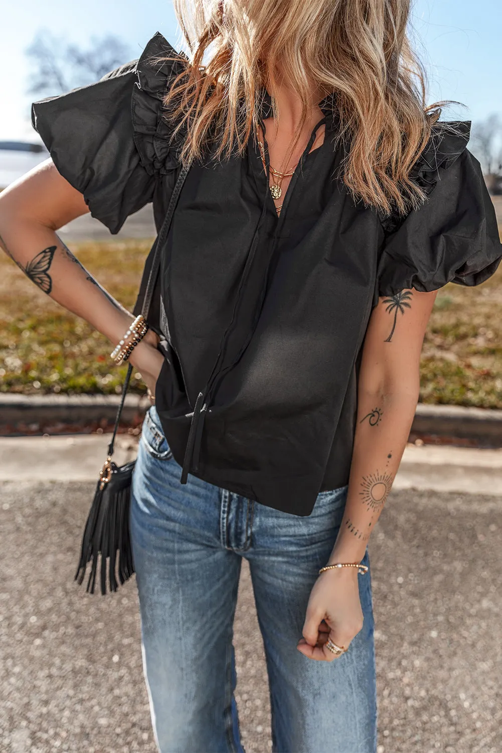 Black Ruffled Puff Short Sleeve Loose Blouse sold by Beagle Boutique product image thumbnail 3