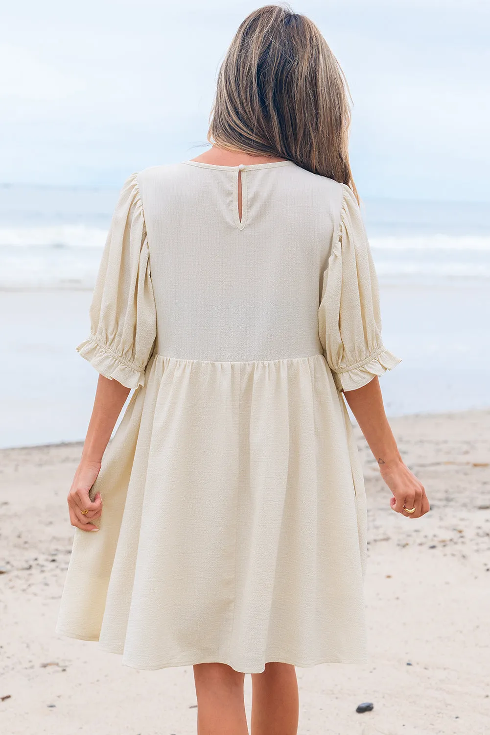 White Textured Ruffled Puff Sleeve Oversized Dress sold by Beagle Boutique product image thumbnail 5