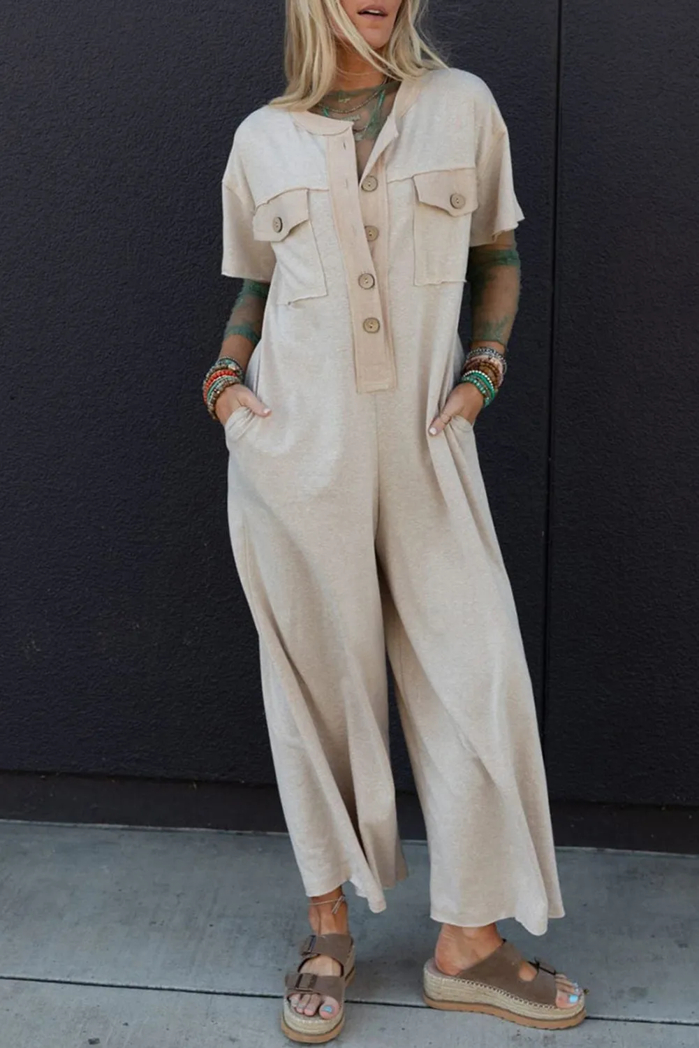 Beige Half Placket Chest Pockets Short Sleeve Wide Leg Jumpsuit sold by Beagle Boutique