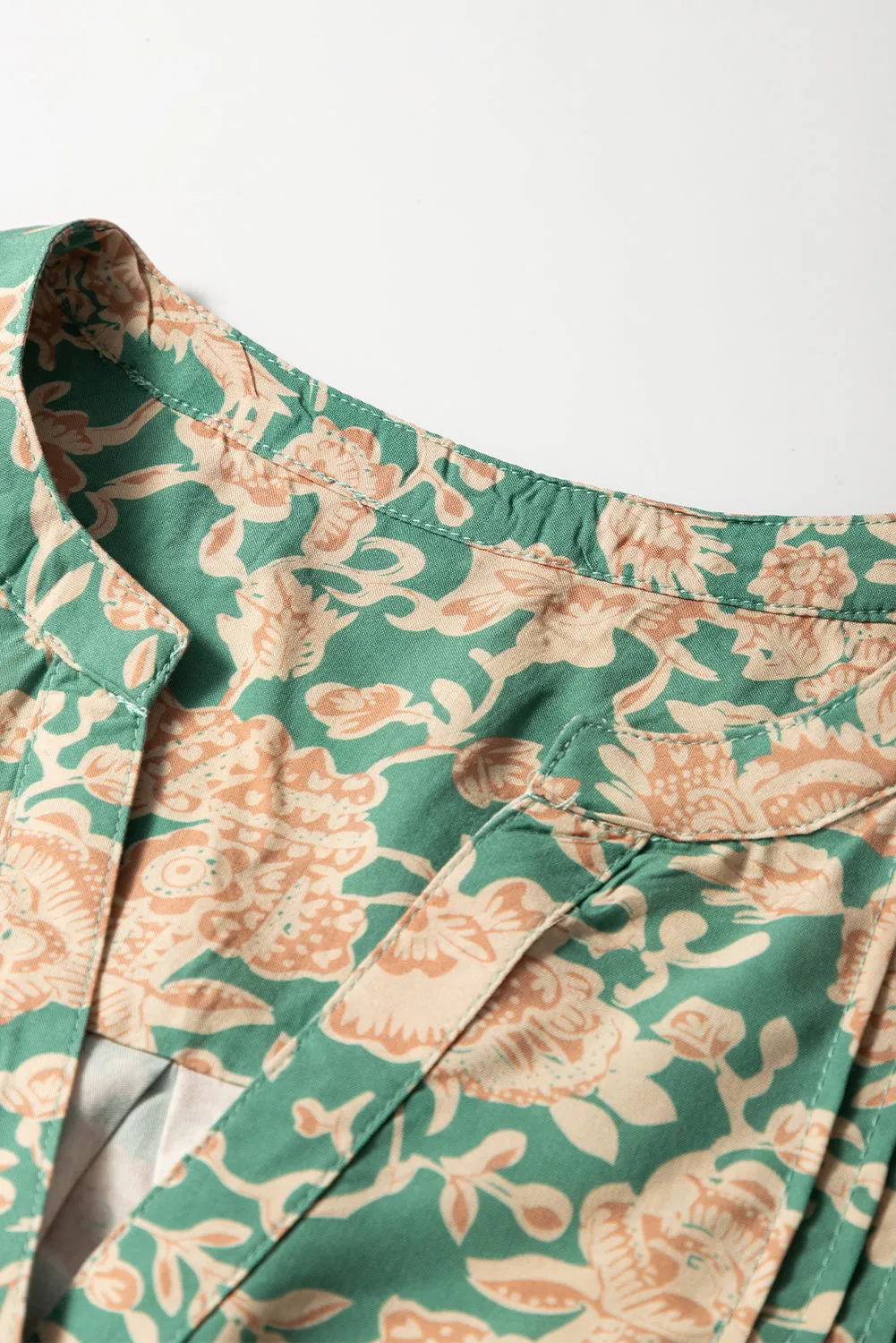 Green Floral Print Pleated Buttoned V Neck Short Sleeve Blouse sold by Beagle Boutique product image thumbnail 5
