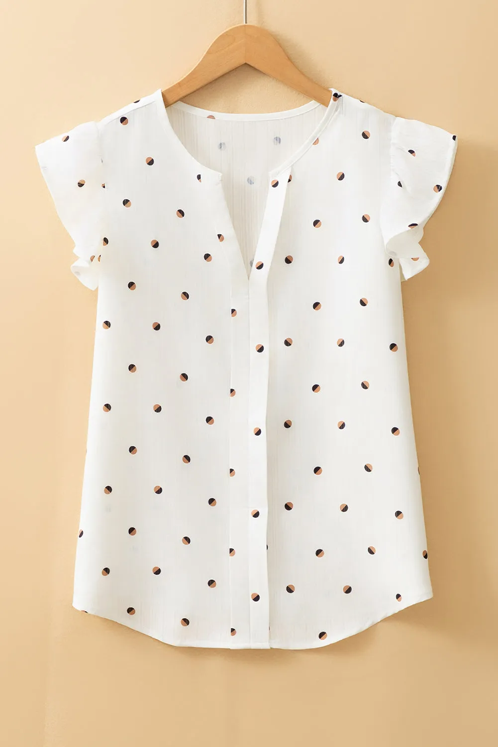 White Polka Dot Print Ruffled Shoulder V Neck Blouse sold by Beagle Boutique product image thumbnail 4
