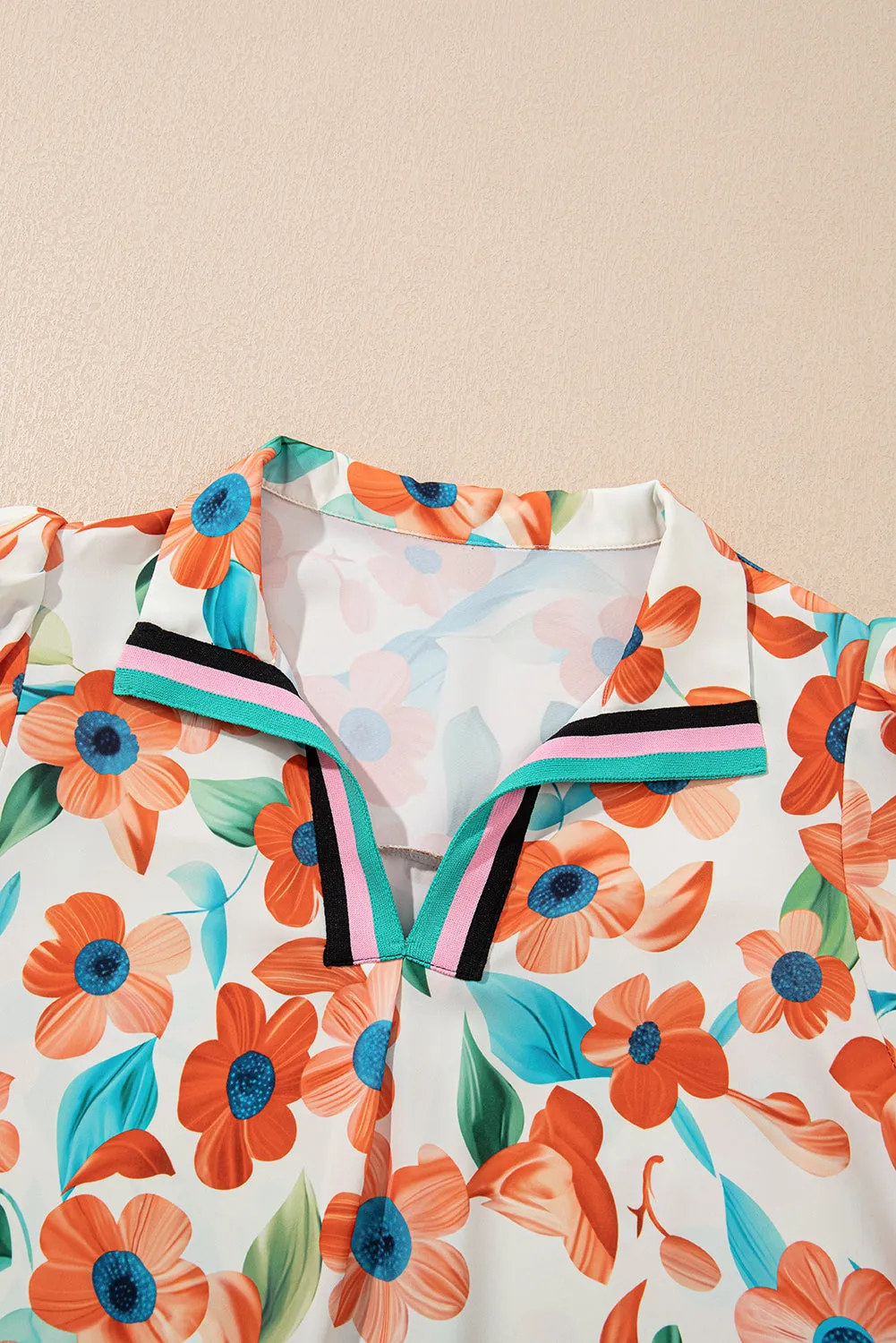 Contrast Trim Floral Split Neck Puff Short Sleeve Tiered Mini Dress sold by Beagle Boutique product image thumbnail 5