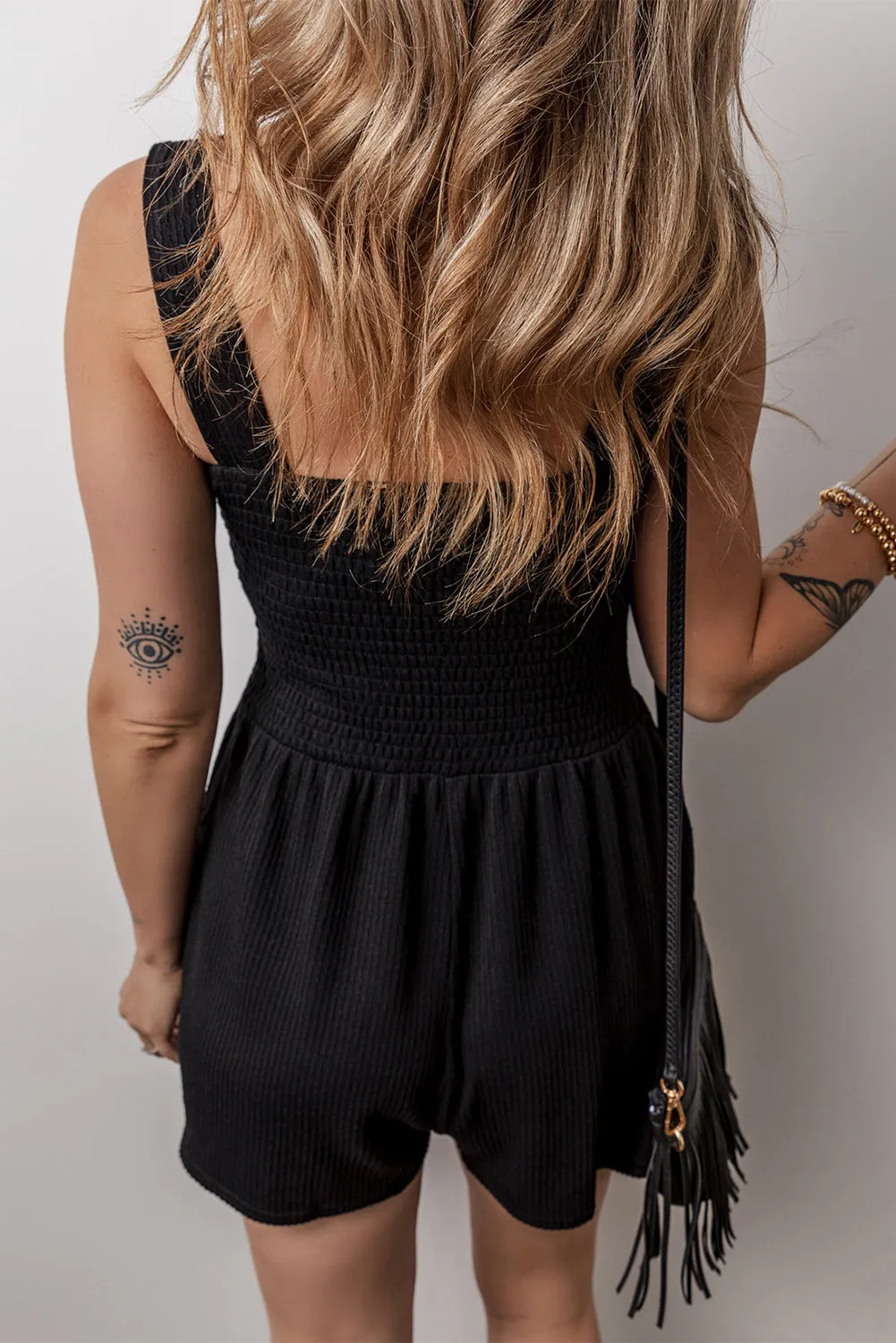Black Smocked Bust Textured Knit Sleeveless Romper sold by Beagle Boutique product image thumbnail 2