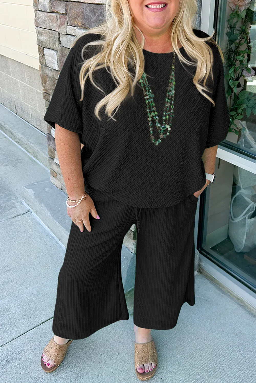 Black Textured Batwing Sleeve Tee Wide Leg Trousers Plus Size Set sold by Beagle Boutique