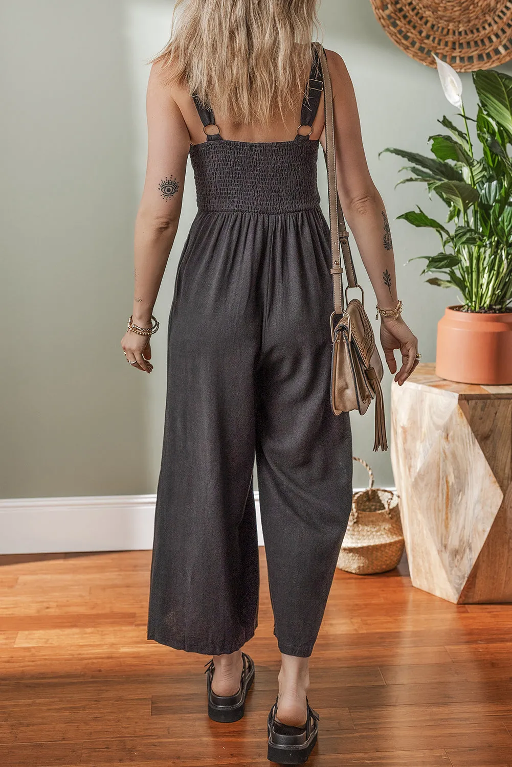 Black Front Cut Out Smocked Back Sleeveless Wide Leg Jumpsuit sold by Beagle Boutique product image thumbnail 2