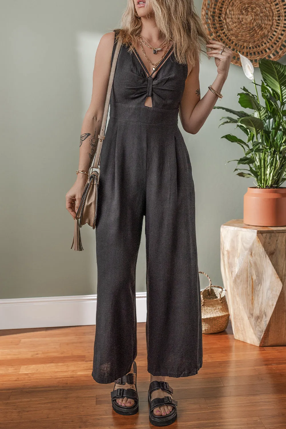 Black Front Cut Out Smocked Back Sleeveless Wide Leg Jumpsuit sold by Beagle Boutique product image thumbnail 4
