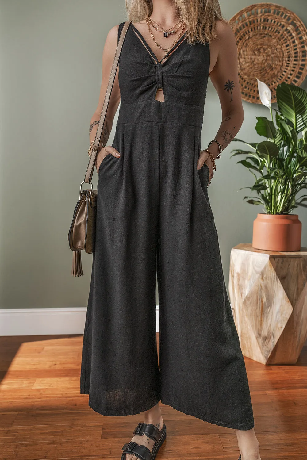 Black Front Cut Out Smocked Back Sleeveless Wide Leg Jumpsuit sold by Beagle Boutique product image thumbnail 3
