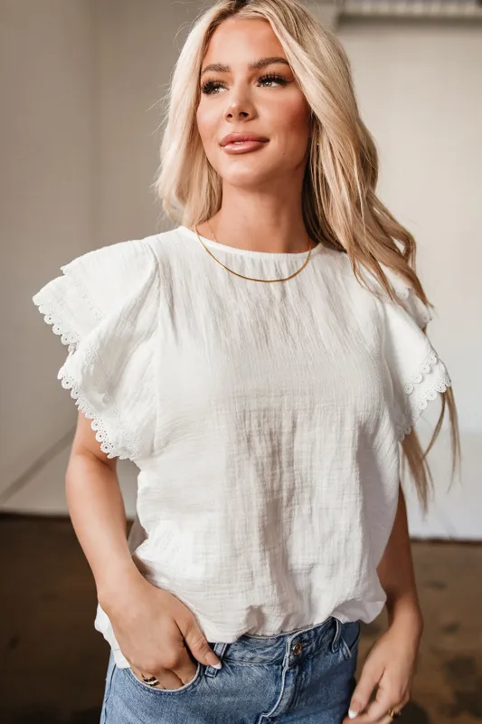 White Crinkled Layered Ruffled Flutter Sleeve Blouse sold by Beagle Boutique