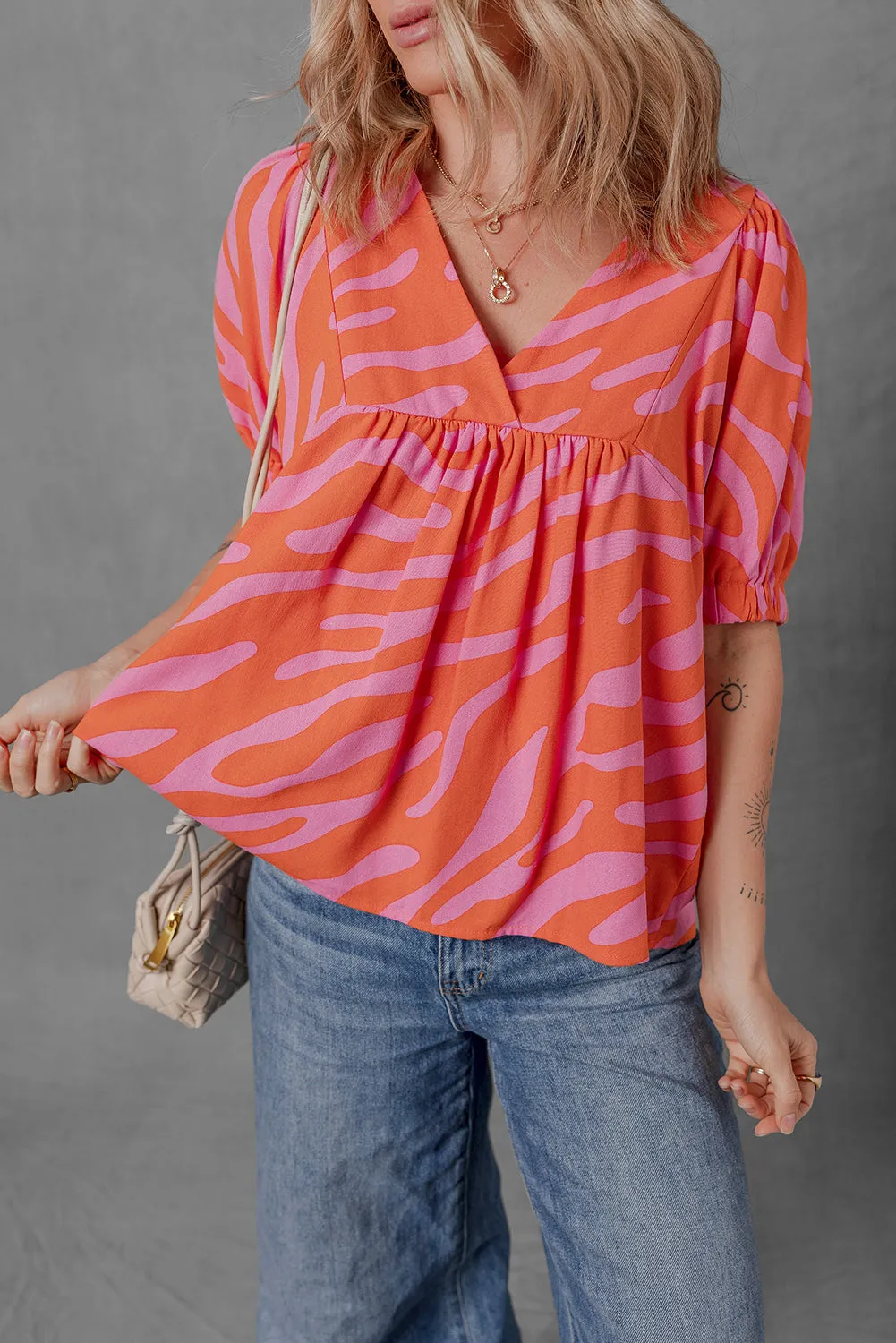 Orange Zebra Stripe Print Ruched Cuff Half Sleeve V Neck Blouse sold by Beagle Boutique product image thumbnail 3