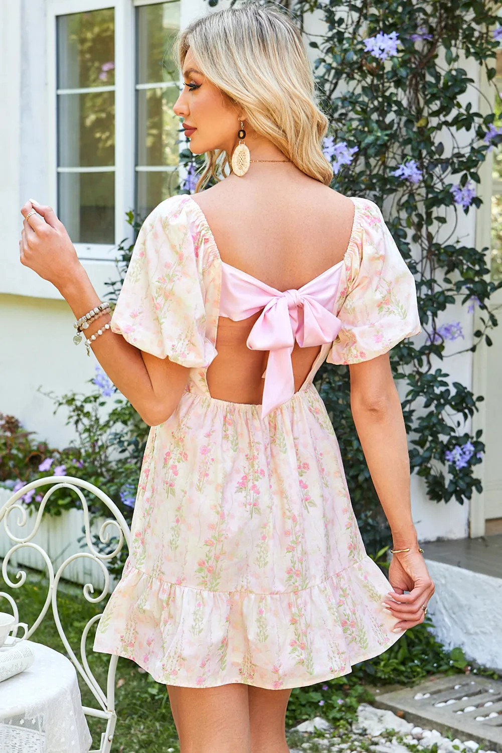 Pink Floral Puff Sleeve Square Neck Knotted Open Back Ruffled Mini Dress sold by Beagle Boutique product image thumbnail 2