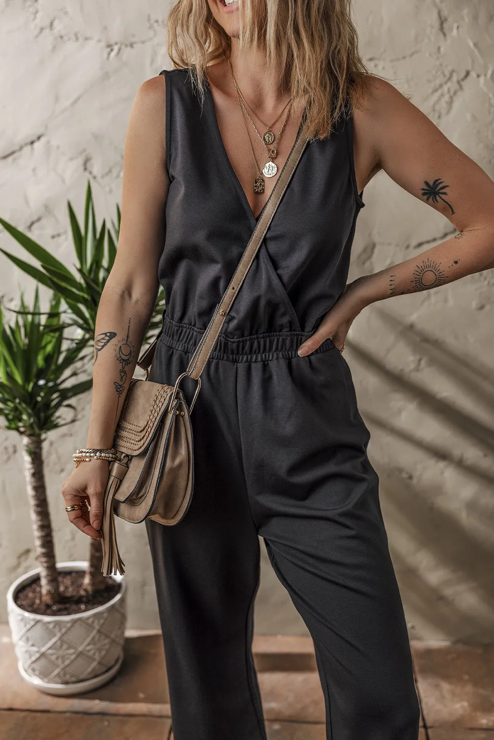 Black Wrap V-Neck Sleeveless Jumpsuit sold by Beagle Boutique product image thumbnail 3