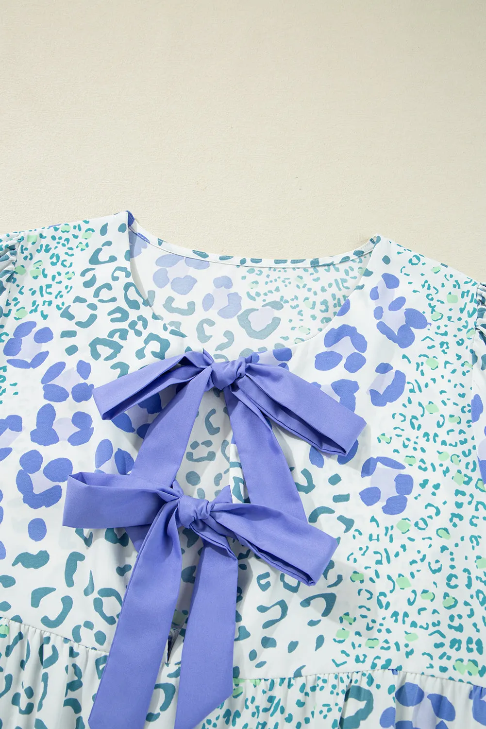 Blue Leopard Contrast Bow Puff Sleeve Mini Dress sold by Beagle Boutique product image thumbnail 5