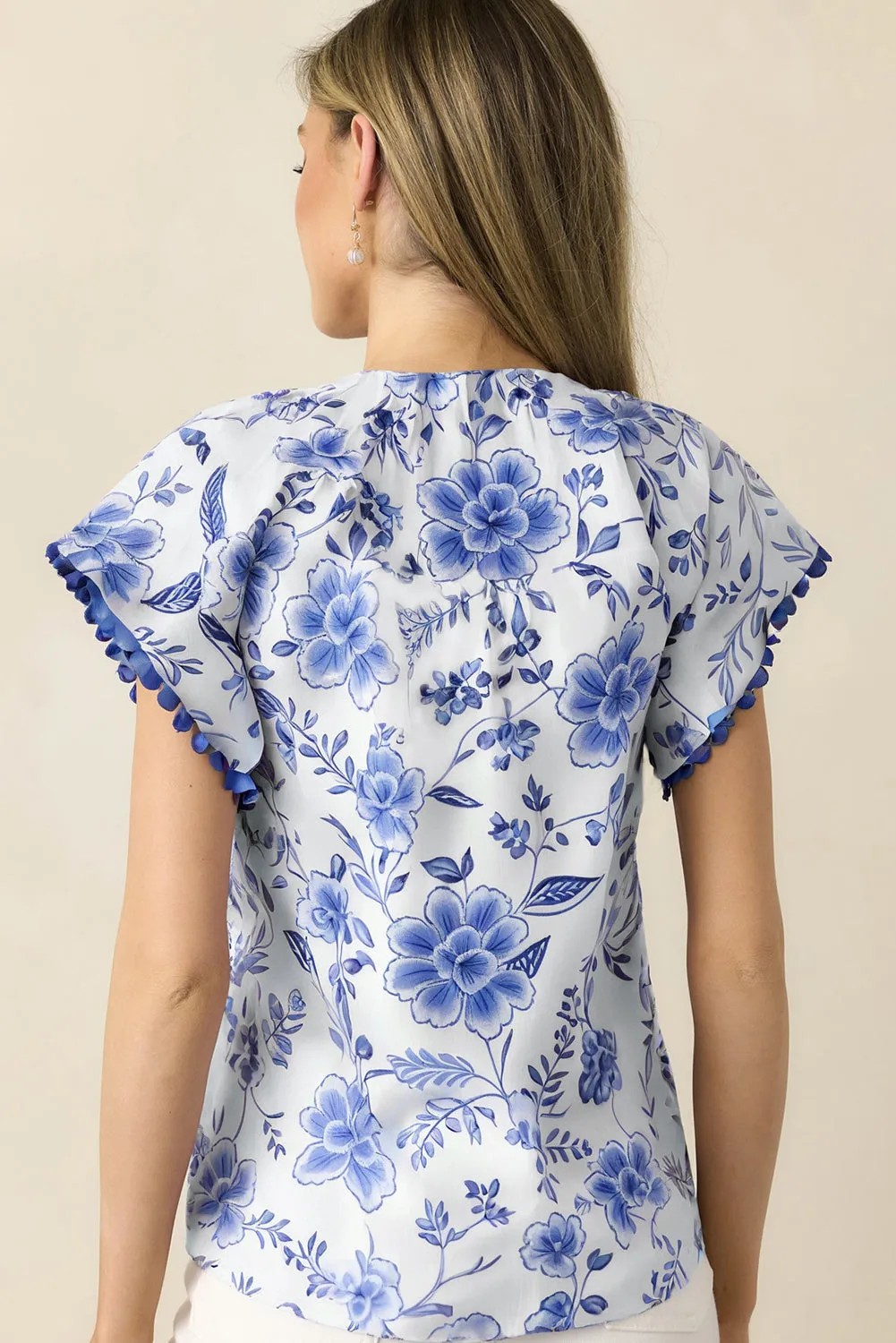 Blue Elegant Floral Print Ricrac Trim Short Sleeve Blouse sold by Beagle Boutique product image thumbnail 2