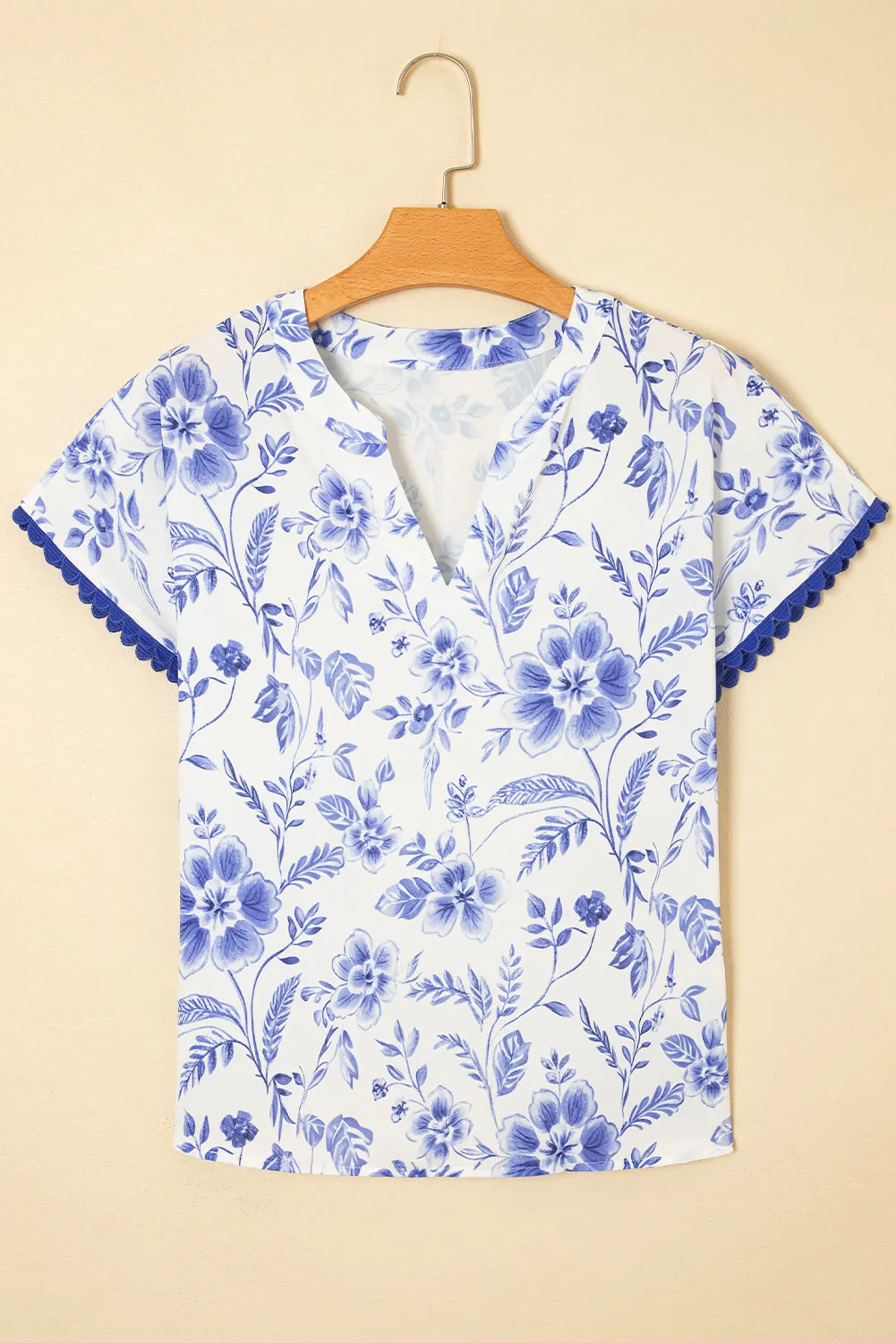 Blue Elegant Floral Print Ricrac Trim Short Sleeve Blouse sold by Beagle Boutique product image thumbnail 4