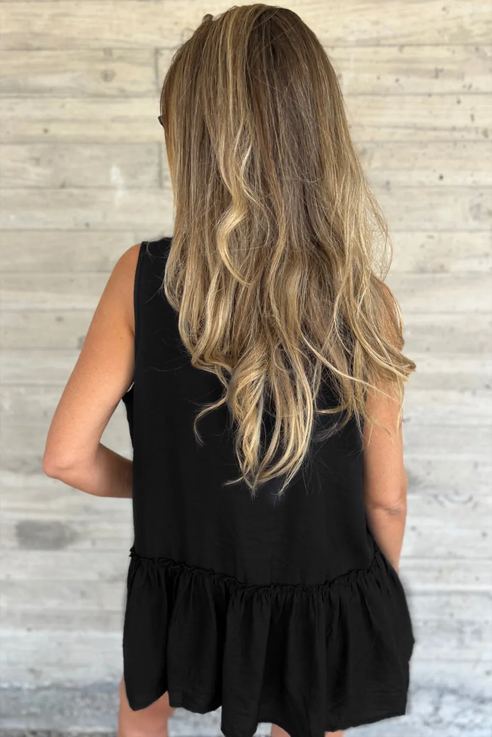 Black Sleeveless Buttoned Front Ruffle Hem Tunic Shirt sold by Beagle Boutique product image thumbnail 2