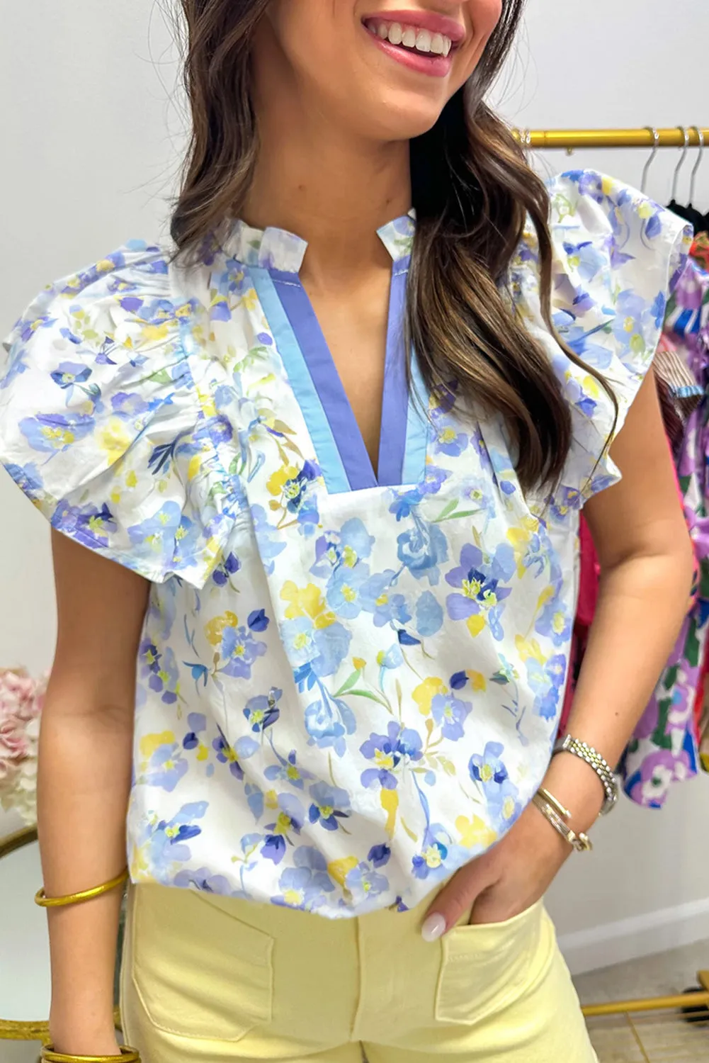 Sky Blue Floral Print Frilled Notched V-Neck Blouse sold by Beagle Boutique