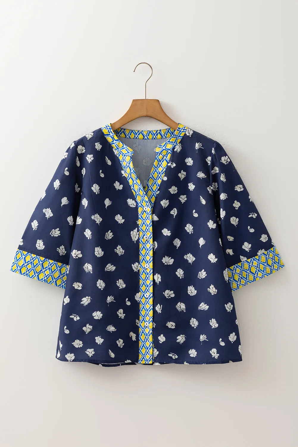 Blue Floral Print Half Sleeve Contrast Trim V Neck Blouse sold by Beagle Boutique product image thumbnail 3