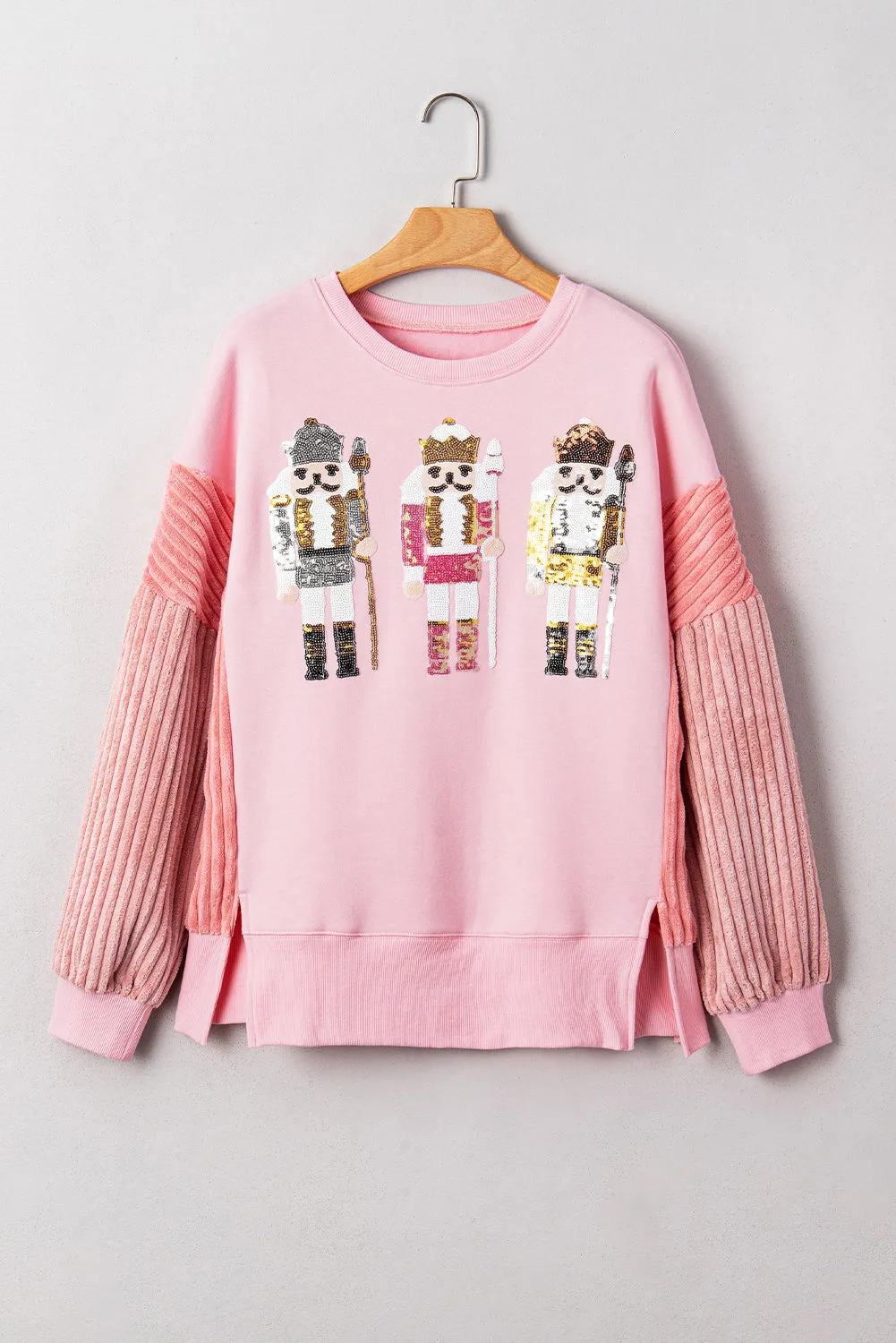 Sequin Nutcracker Textured Sleeve Patchwork Sweatshirt sold by Beagle Boutique