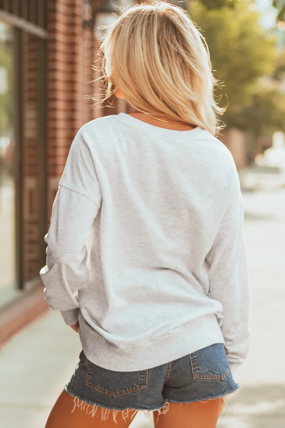 Vintage Washed GAME DAY Graphic Baggy Sweatshirt sold by Beagle Boutique product image thumbnail 2